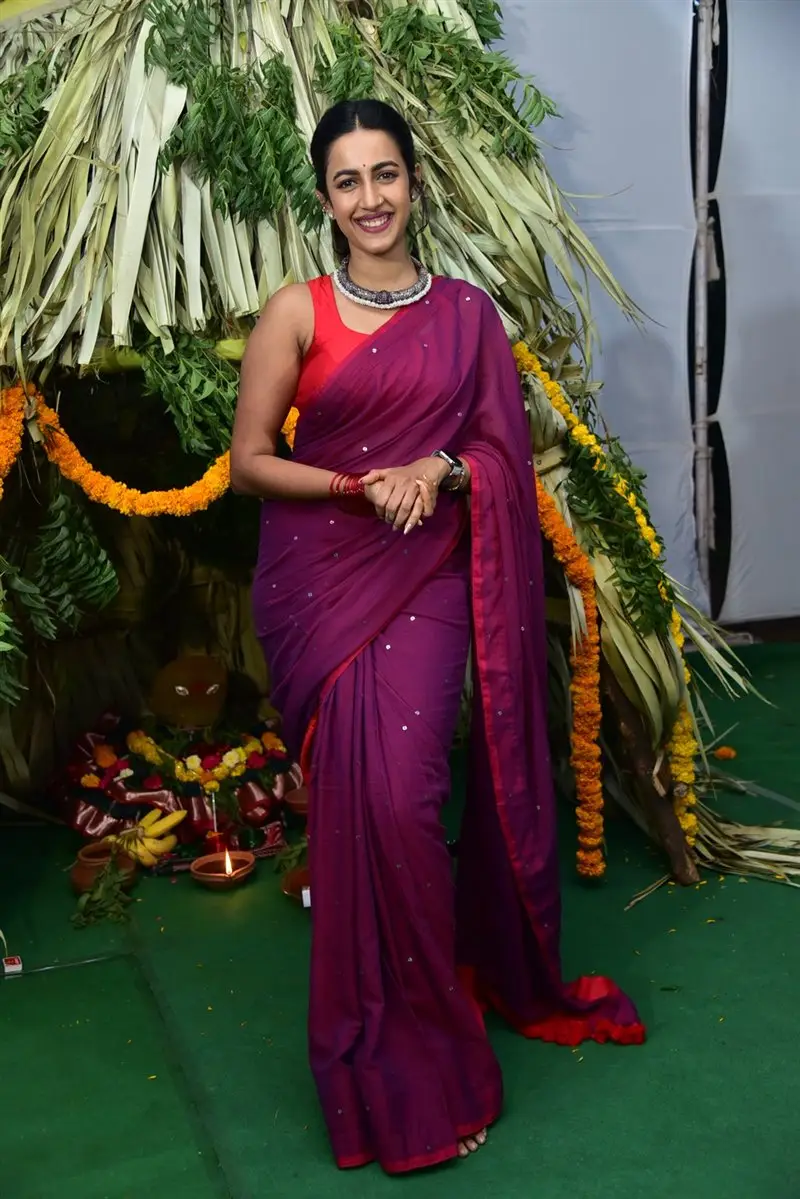 Niharika Konidela Stills in Violet Saree Sleeveless Orange Blouse